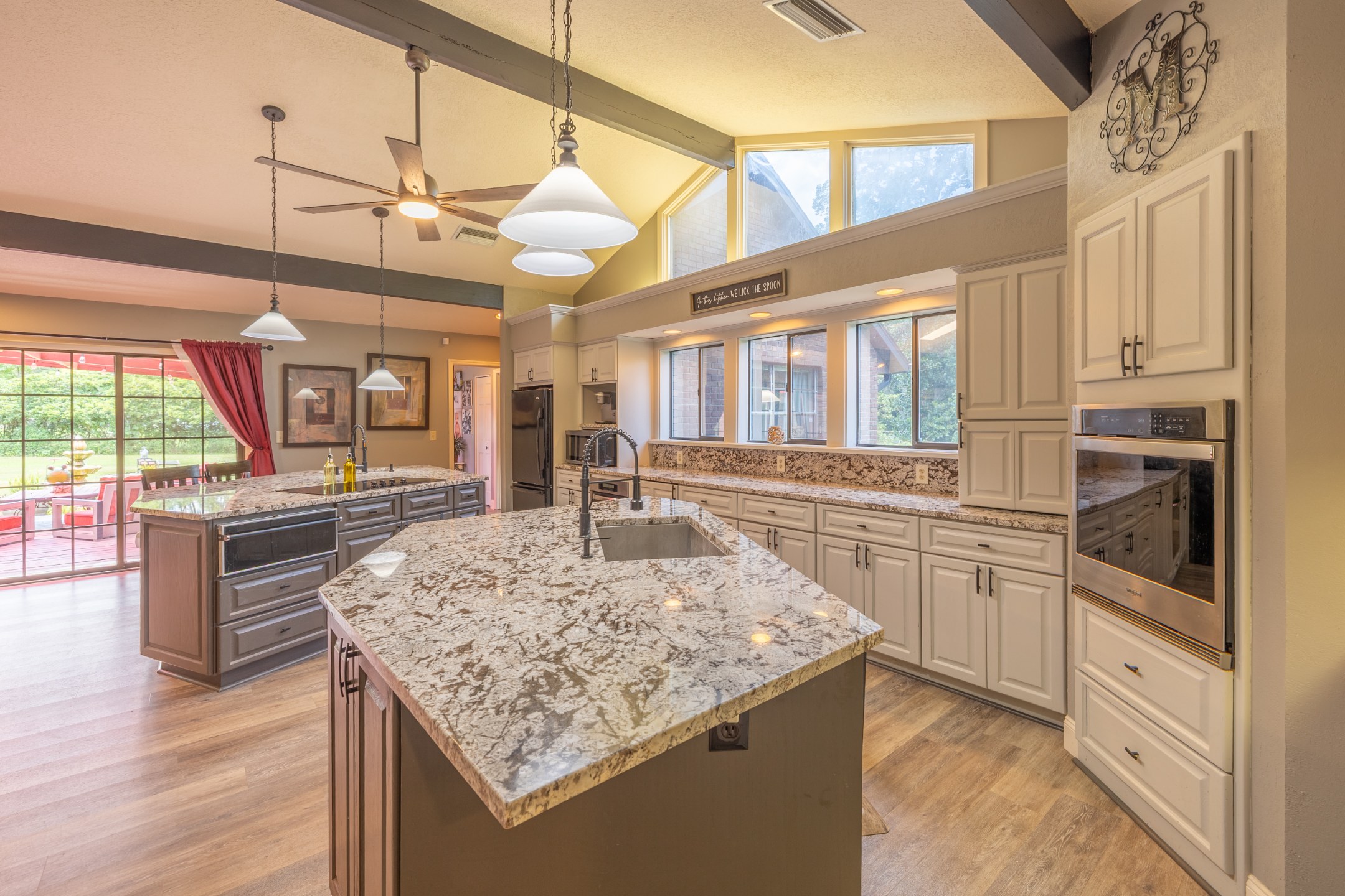 Kitchen with island seating and pendant lighting