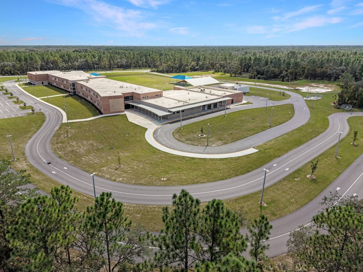 Drone photo of Ross Prairie Elementary School surrounded by forest, Ocala FL