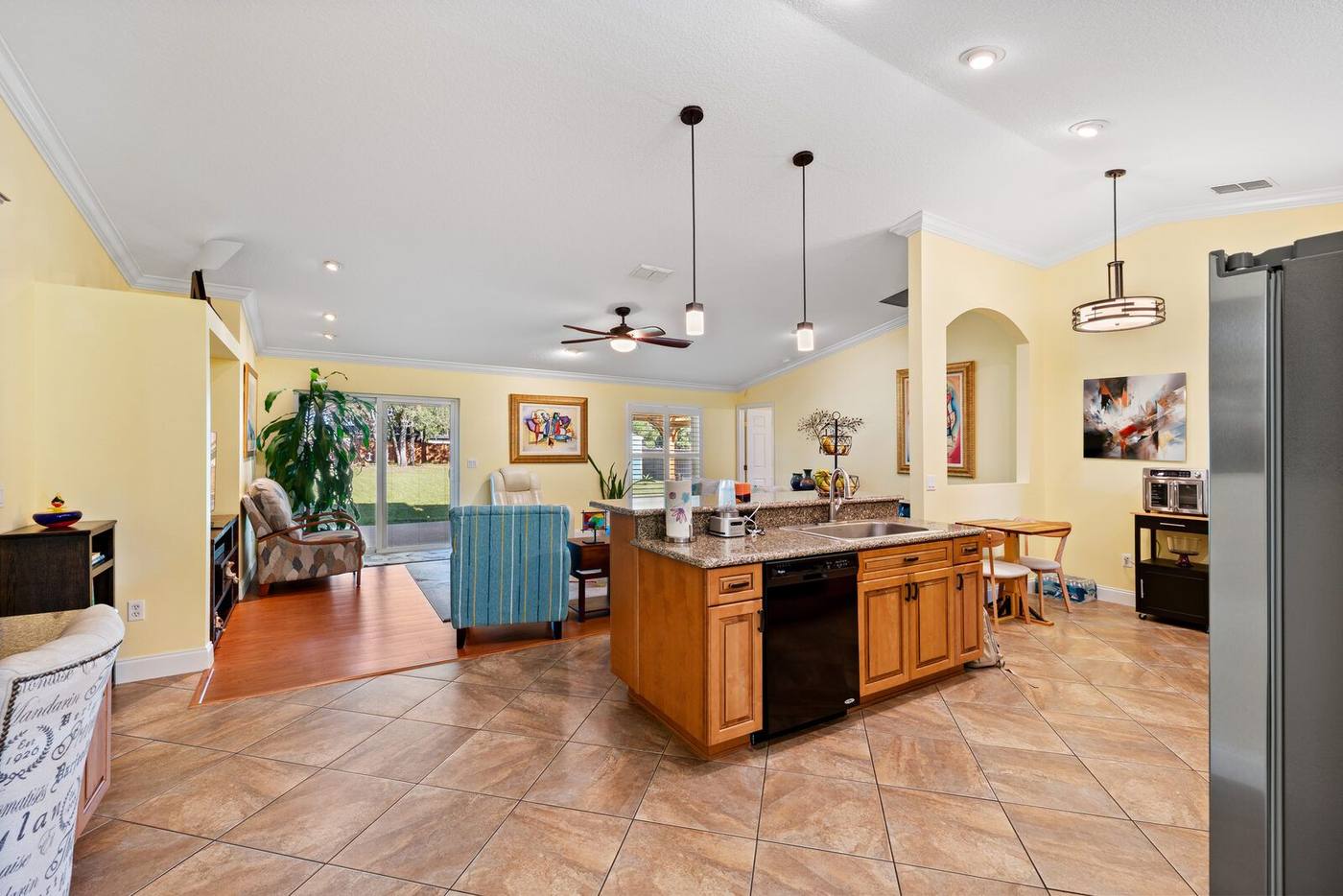 Open-concept great room listing photograph